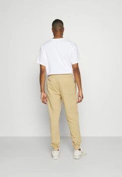 Pepe Jeans AARON PANT - Pantalon De Survêtement - Beige -Pepe Jeans Soldes Magasin 9c37592aff684ca4a4ee048e349331e4